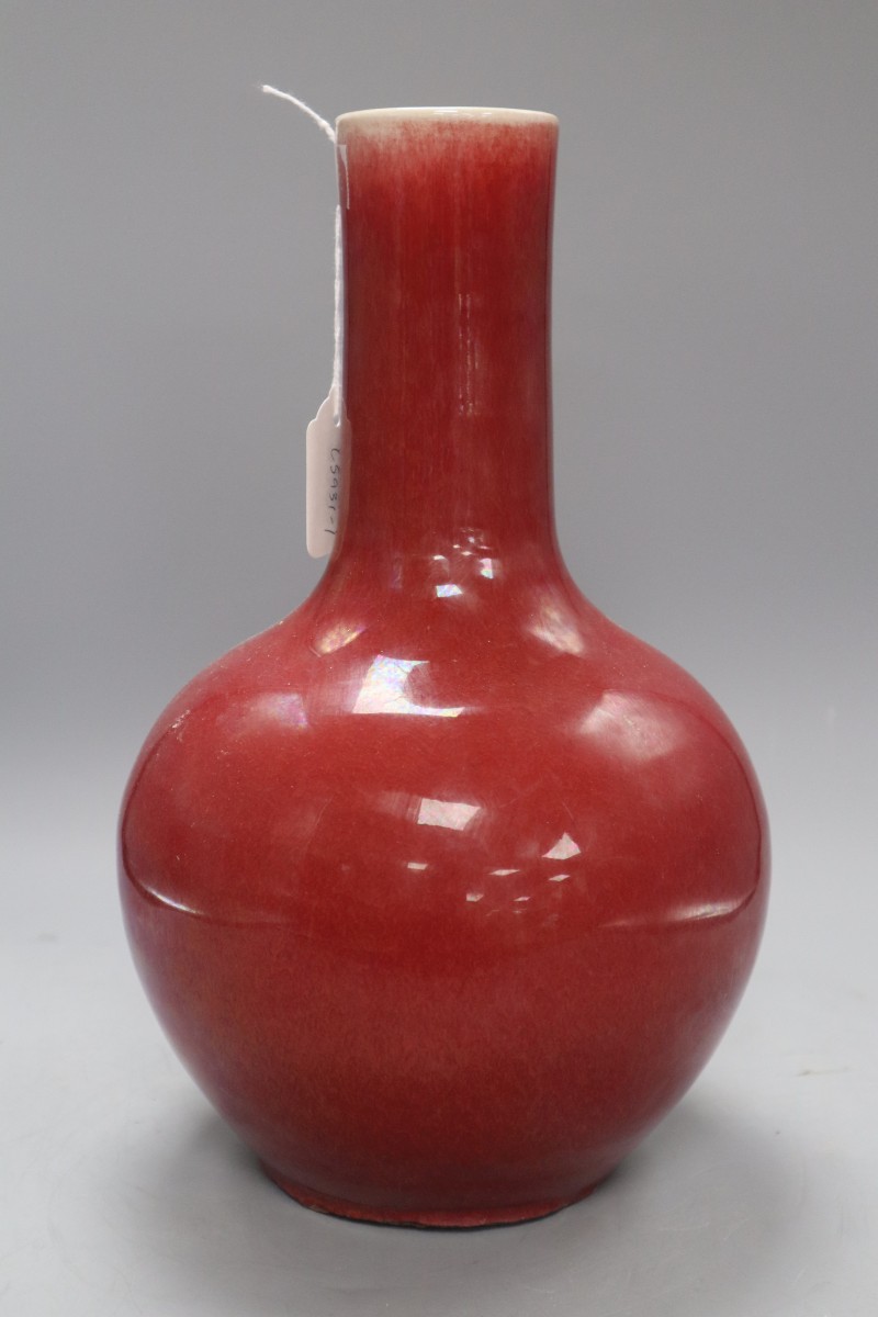 A Chinese sang de boeuf bottle vase, height 34cm